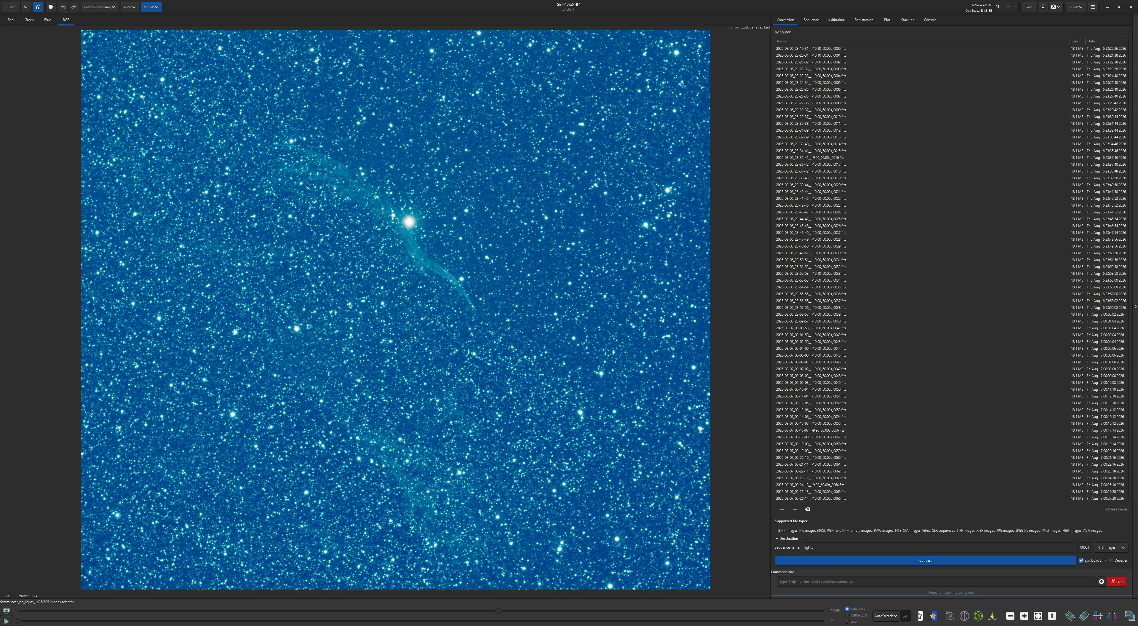 The stacked image seen and aggressively auto stretched in Siril